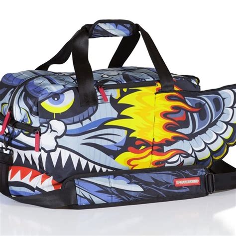 sprayground duffle bags|sprayground caught up bag.